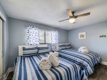 Guest Bedroom with Two Double Beds at 606 Queens Grant